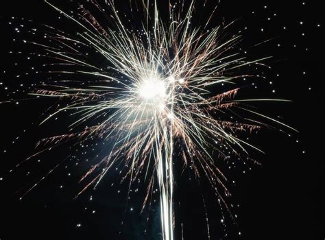 Brightly Colorful Explosive Fireworks Light Up The Night Sky At New