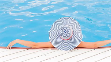 Woman Relaxing In Pool Summer 4k Wallpapers Hd Wallpapers
