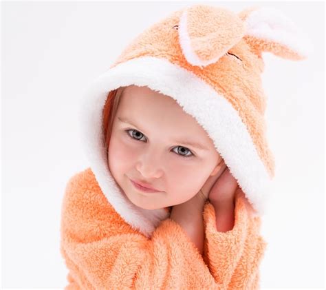 Premium Photo Shy Little Bunny Girl In Peachy Robe