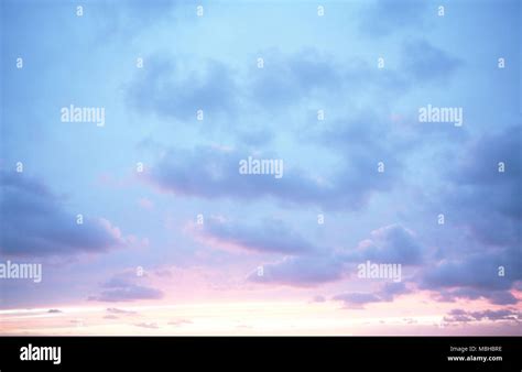 Red Sunset Sky With Blue Clouds Stock Photo Alamy