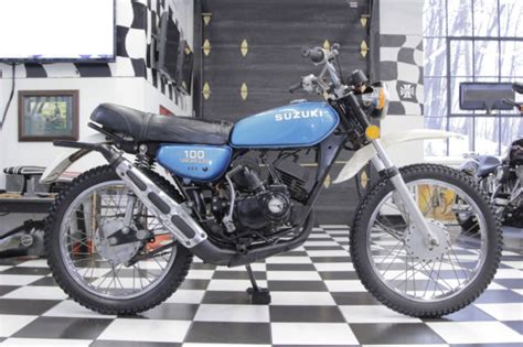 Specifications, appearance, colours (including body colour), equipment, materials and other aspects of the suzuki products. 1976 Suzuki TS100 Enduro 2 stroke