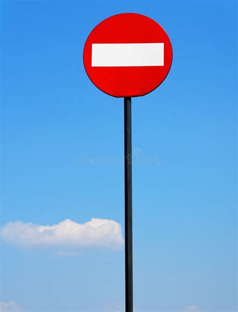 Road Sign On A Metal Pole Do Not Enter Sign Against A Blue Sky With