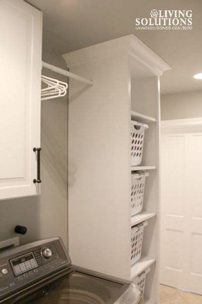 Laundry chute laundry chute behind a large cabinet door hides a giant laundry bin which gets fed by the master bedroom laundry chute above laundry chute cabinet. Our Laundry Room - Living Solutions blog