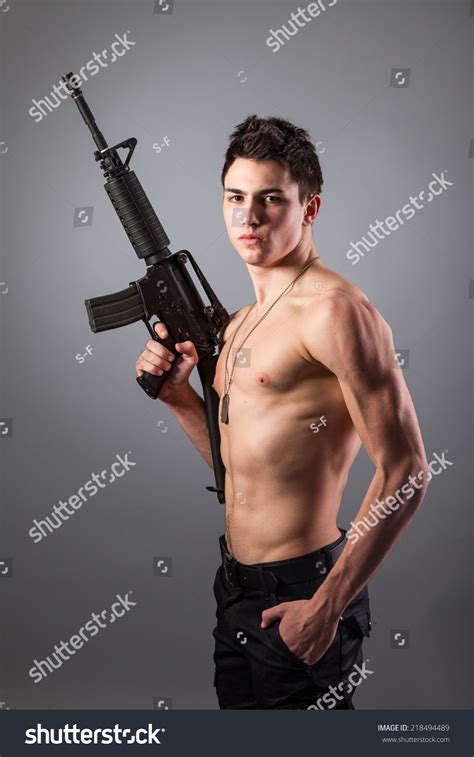 Handsome Barechested Soldier Holding Rifle On Stock Photo 218494489