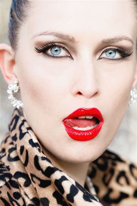 Subtle Eyes Enhanced By The Elegance Of A Carmine Red Lipstick Bold