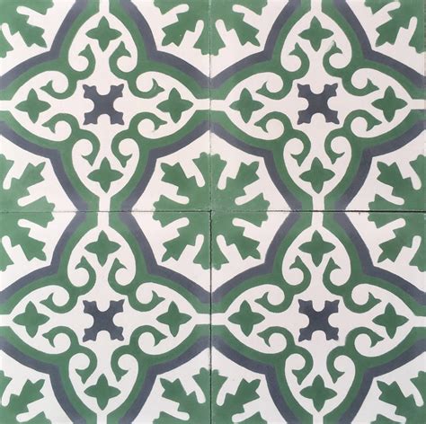 A Green And White Tile Pattern On The Floor