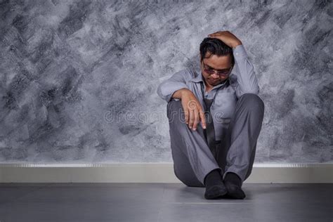 Depressed Businessman Sitting On The Floor Stock Photo Image Of