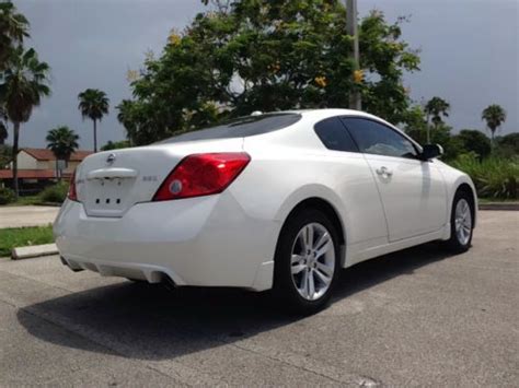 View photos, features and more. Buy used 2011 Nissan Altima S Coupe 2-Door 2.5L in Fort ...
