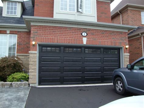 Houses With Black Garage Doors For Elegant House Style