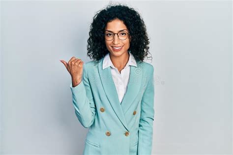 Young Latin Girl Wearing Business Clothes And Glasses Smiling With