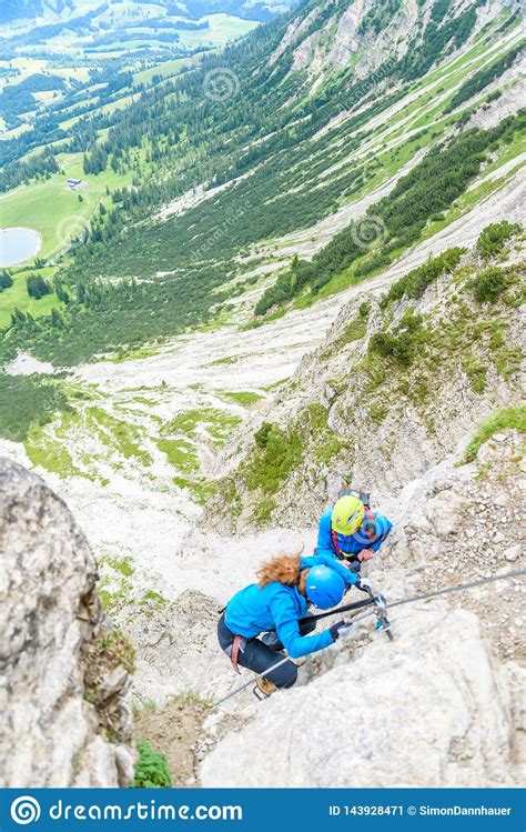 Hiker Climbing In The Mountain Of Alps Europe Stock Image Image Of