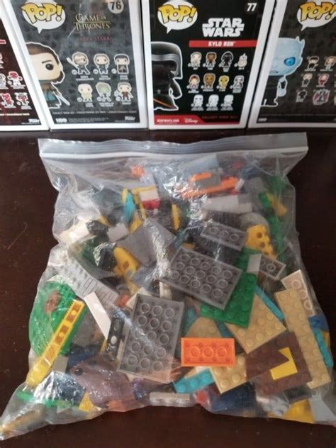 Over 2 Pounds Of Legos From A Few Different Sets Including Marvel And