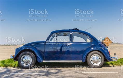 Classic Blue Volkswagen Beetle With A Picknick Basket On The Back Stock