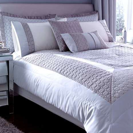 Your bed should be the most comfortable space in your home. Embellished with a circular pattern motif in an elegant ...