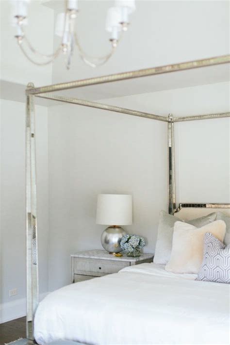 Canopy bed a bed supported by four tall posts with a cross members joining the posts that may be used for a supporting a fabric canopy cover, swags, curtains, etc. Vine Project — KATE MARKER INTERIORS | Mirror canopy bed ...
