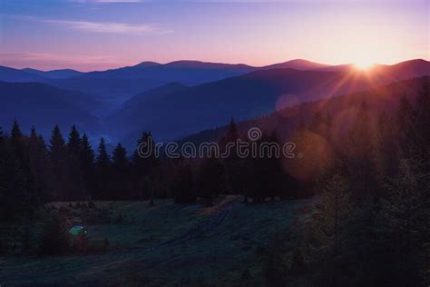 Beautiful Mountain Landscape At Sunrise View Of Hills Covered Forest