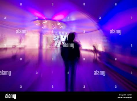 Mysterious Silhouette Man Walking In Colorful Tunnel Stock Photo Alamy