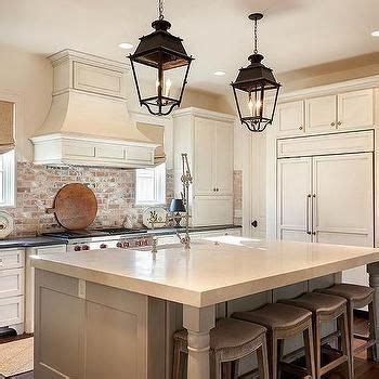 Get trade quality kitchen storage units, panels & doors priced low. Kitchen with used red brick backsplash and lantern ...