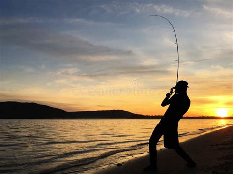 Young Man Fishing At Sunset Stock Image Image Of Catch Landscape