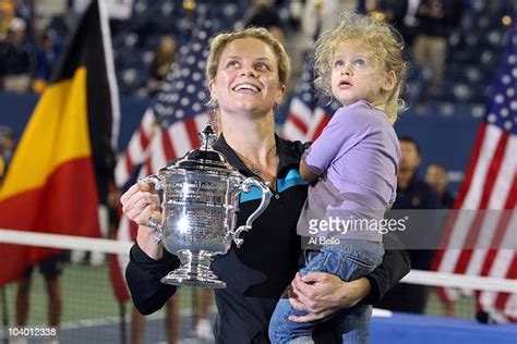 Kim Clijsters Of Belgium And Daughter Jada Pose With The Championship