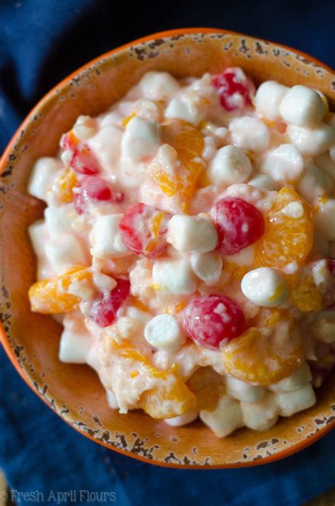 This salad is rich with fruit and a sweet, creamy sauce. Healthier Ambrosia Salad