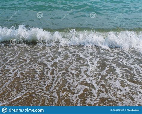 Closeup Of Sea Wave With Surf And Foam Natural Movement Of Sea Water