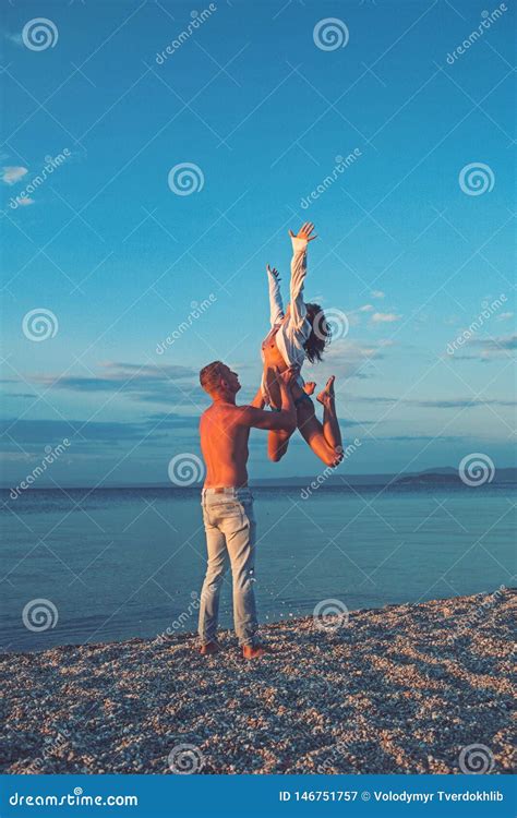 Girl And Man Jump On Sand Happy Family On Valentines Day Love Relations Of Naked Couple At Sea