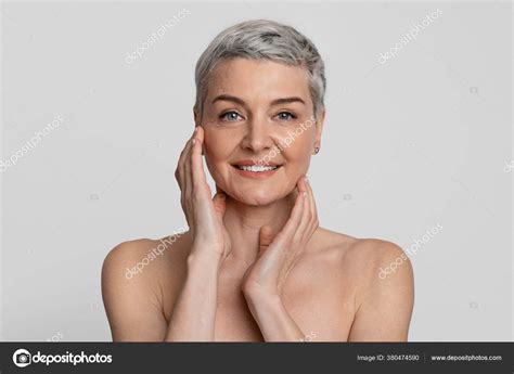 Mature Beauty Portrait Of Nude Beautiful Middle Aged Woman Touching