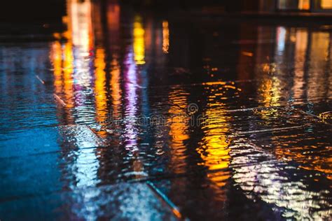 Rainy Night In A Big City Reflections Of Lights On The Wet Road