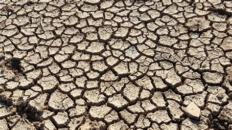 Dry cracked earth during climate change drought disaster Stock Video ...