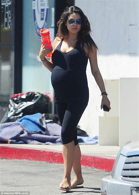 Mila Kunis Puts Her Very Big Bump On Display In Clingy Workout Gear