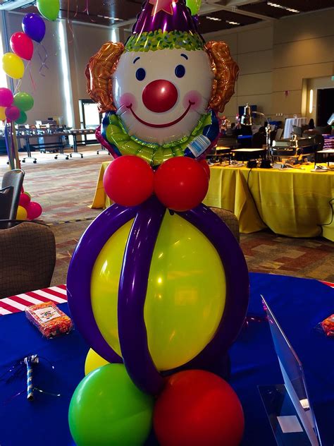 The elephant balloon is large and colorful. Clown balloon centerpiece for Alyssa's 1st birthday ...