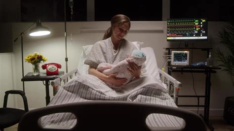 Mother Admiring Newborn Baby Filmpac