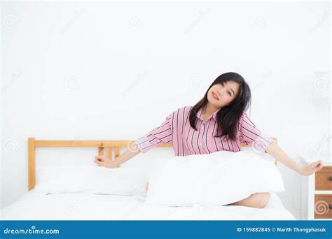Beautiful Of Portrait Young Asian Woman Stretch And Relax In Bed After