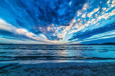 Dark Clouds Over The Sea At Sunset Stock Image Image Of Cloudy