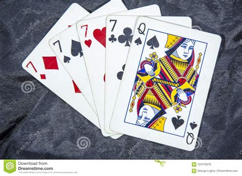 Five Playing Card S A Hand Of A Four Of A Kind Seven S And A Queen