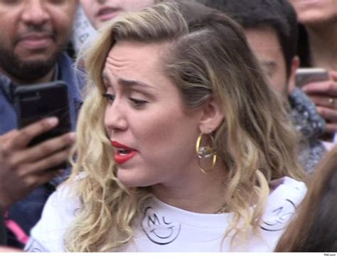 Miley Cyrus Groped Choked By Fan In Spain With Liam Hemsworth Feet Away Heard Zone
