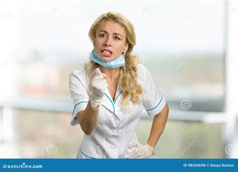 Angry Young Nurse Pointing With Finger Stock Photo Image Of Gesture