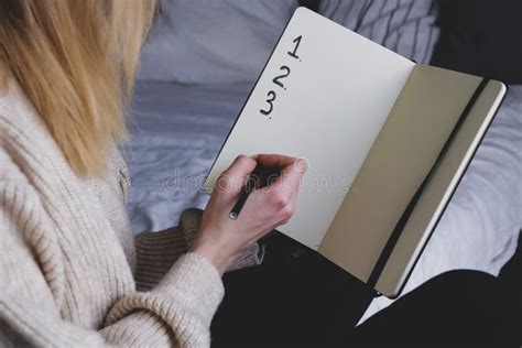 Woman Write In Her Black Diary Sitting On Bed Stock Image Image Of