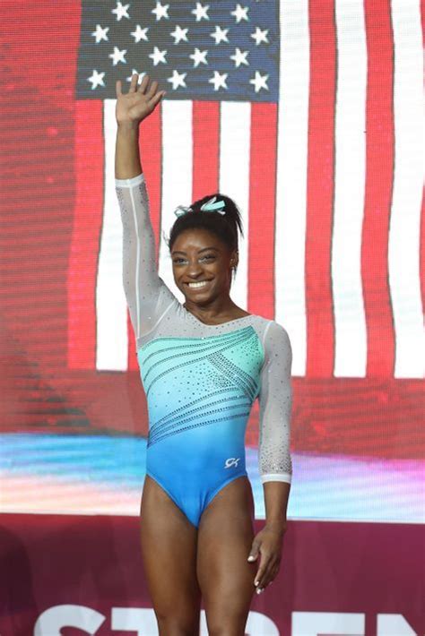 simone biles makes history as first woman to win four all around world titles 2