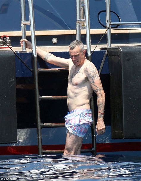 Daniel Day Lewis Takes A Dip In The Sea While Holidaying On Steven
