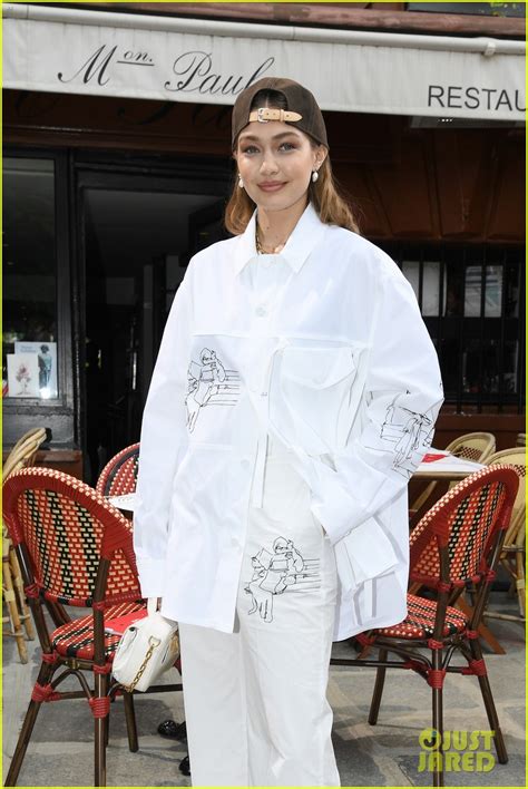 Gigi Hadid Wears Backwards Baseball Cap At Louis Vuitton Fashion Show