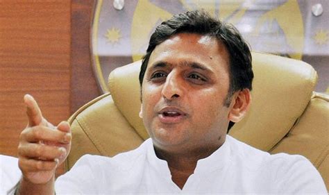 akhilesh yadav press conference free cell phones medical services and rs 1000 pension for poor