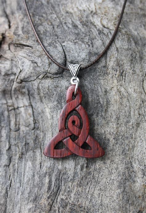 Jump to navigation jump to search. mother and child Celtic knot necklace