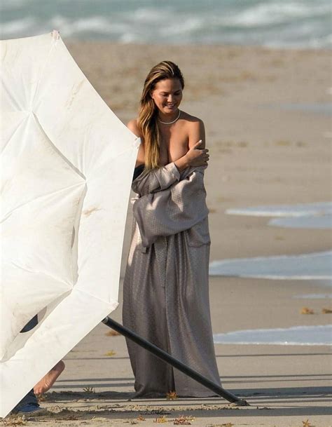 Chrissy Teigen Topless With Her Husband At Photoshoot At Miami Beach