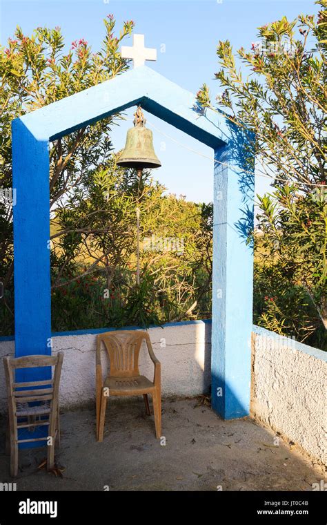Old Small Belfry With Two Chair Greece Stock Photo Alamy