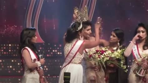 shocking video beauty queen stripped of her title on stage right after her first walk the