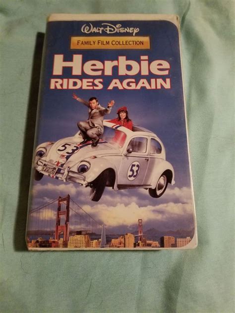 Disneys Herbie Rides Again Vhs 1996 Riding Vhs Book Cover