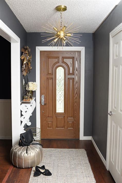 Scroll on for 13 small entryway decorating ideas guaranteed to make this small entryway slash hallway by interior designer rebecca axler of rtg design boasts a row of wall hooks. How to Decorate a Small Foyer | Small entryways, Entryway ...