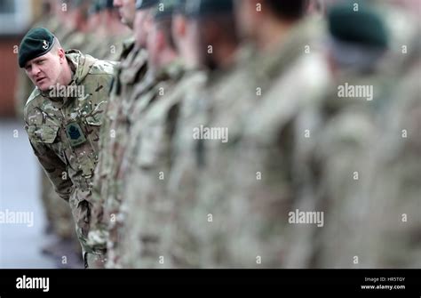 A Colour Sergeant Checks The Line As Members Of 4th Battalion The